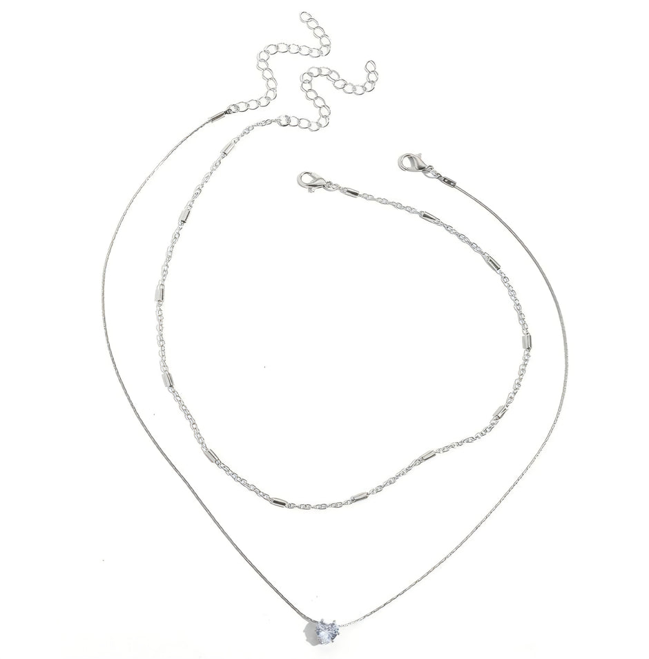 COLLAR DOBLE CON DIJE DE CORAZÓN