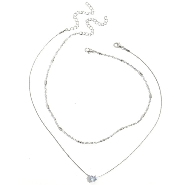 COLLAR DOBLE CON DIJE DE CORAZÓN