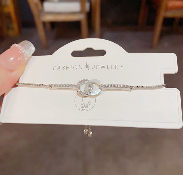 PULSERA AROS ENTRELAZADOS