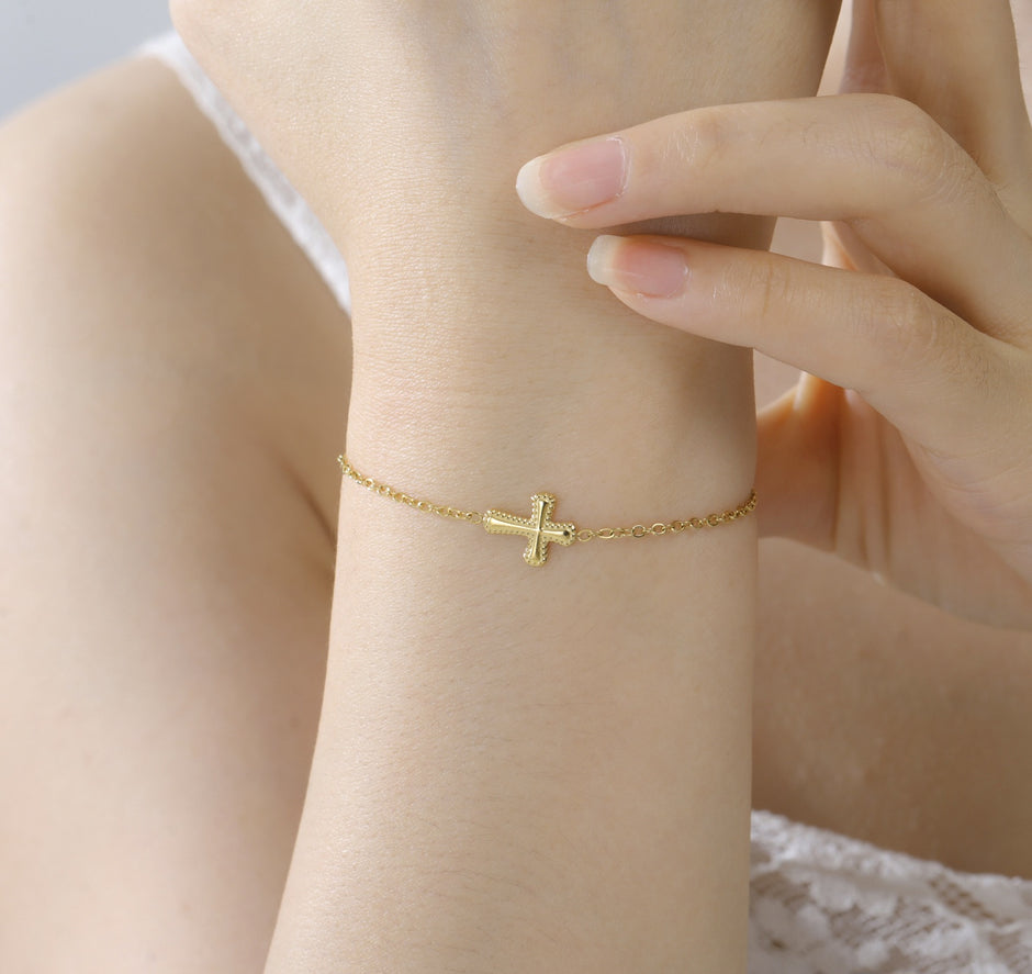 PULSERA CON CRUZ