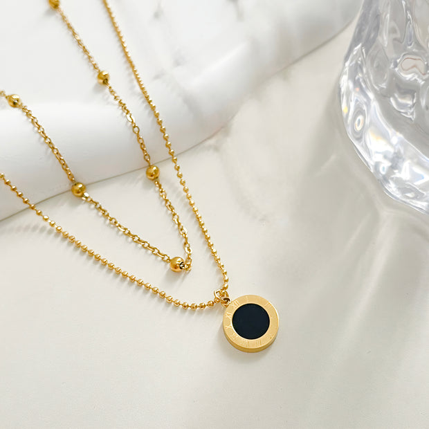 COLLAR DOBLE DIJE ROMANO